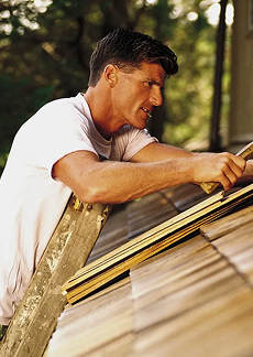 Roofer on a ladder